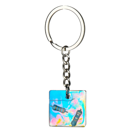 Turkusowy brelok ręcznie robiony do plecaka i kluczy.